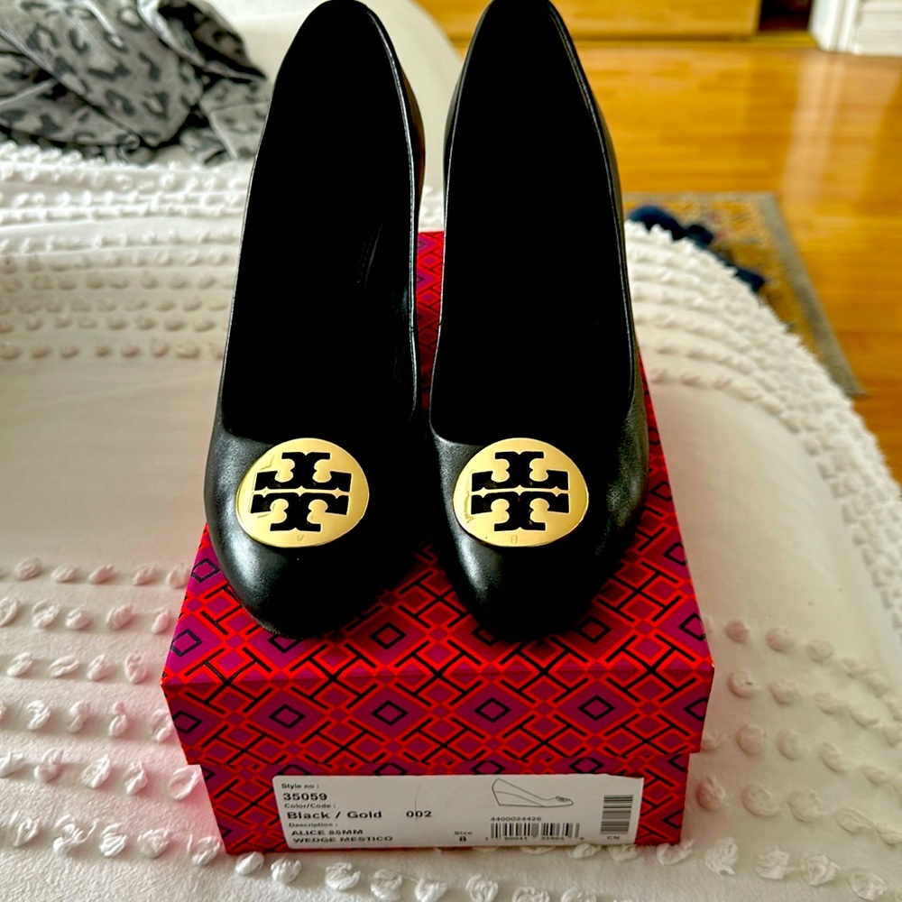 Tory Butch black wedge heel size 8 in excellent condition.
